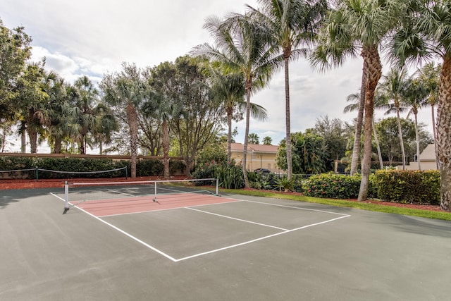 view of sport court featuring basketball hoop