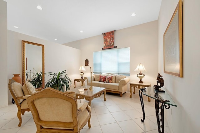 living area featuring recessed lighting and light tile patterned floors