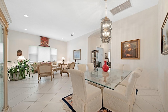 dining space with recessed lighting, light tile patterned flooring, visible vents, and an inviting chandelier