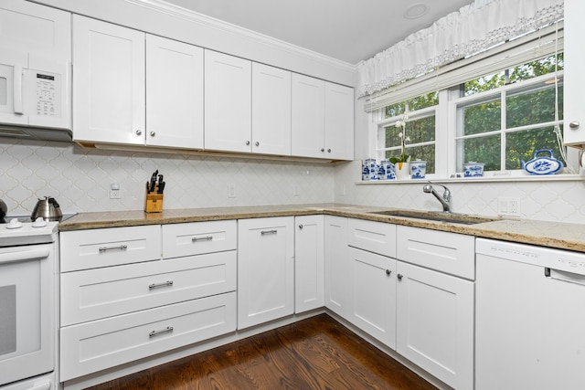 kitchen featuring white cabinetry, sink, dark hardwood / wood-style floors, white appliances, and ornamental molding