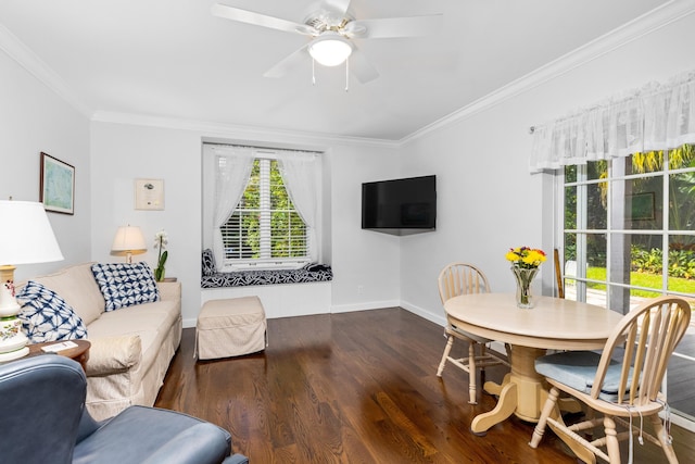 dining room with dark hardwood / wood-style floors, ceiling fan, and ornamental molding