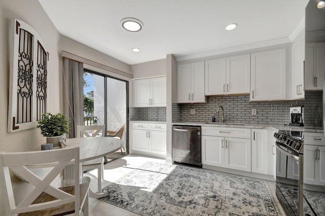 kitchen with black range with electric stovetop, dishwasher, sink, decorative backsplash, and white cabinetry