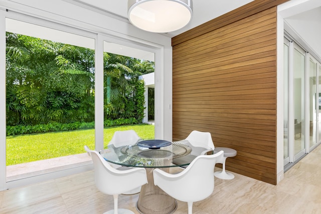 interior space featuring wooden walls