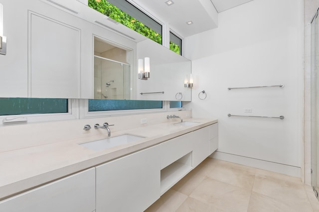 bathroom with vanity and an enclosed shower