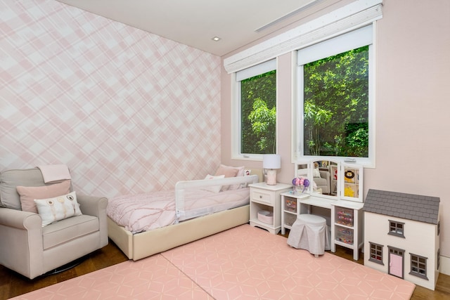 bedroom featuring hardwood / wood-style flooring