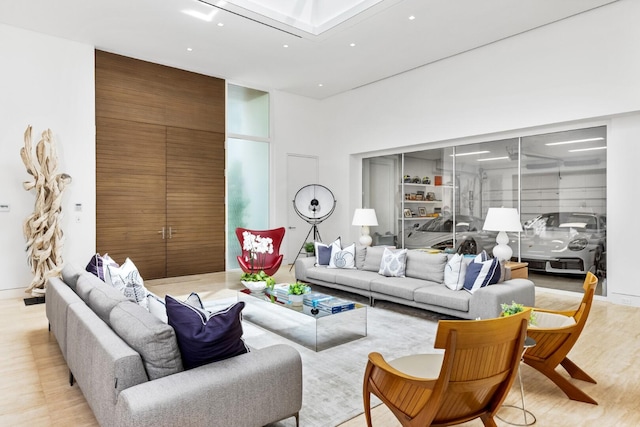 living room with light hardwood / wood-style flooring