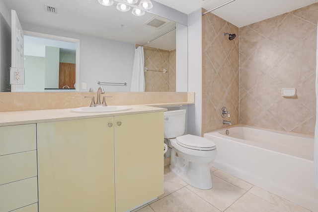 full bathroom with tile patterned flooring, vanity, toilet, and shower / bathtub combination with curtain