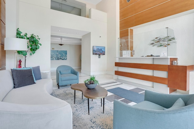 living room featuring a high ceiling