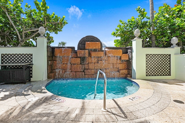 view of pool featuring a patio