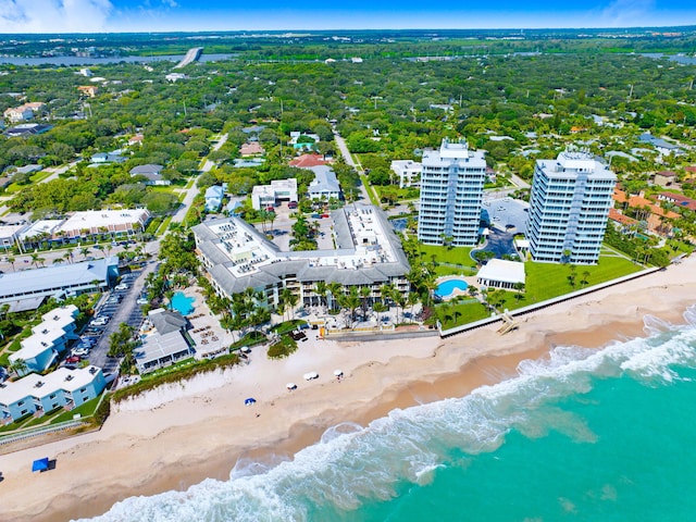 aerial view featuring a water view and a view of the beach