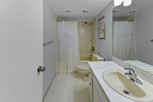 full bathroom featuring shower / bath combo, toilet, and vanity