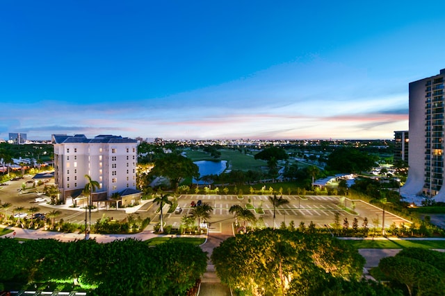 aerial view at dusk with a water view