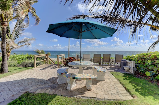 view of patio / terrace featuring a water view