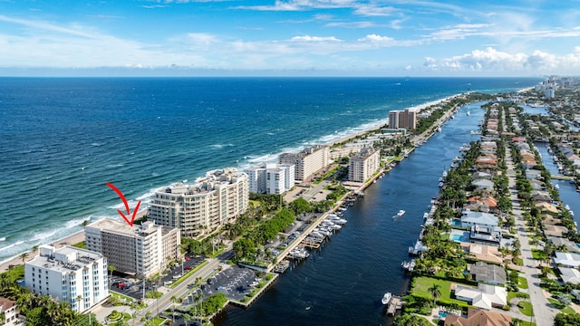 bird's eye view featuring a view of city and a water view