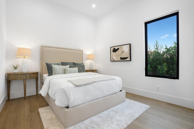 bedroom with light wood-type flooring