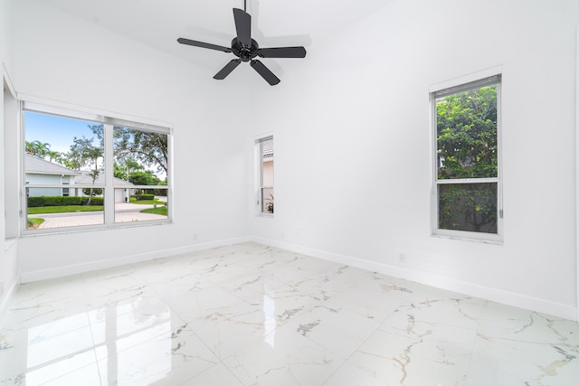 spare room with ceiling fan