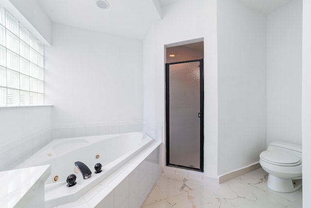 bathroom with separate shower and tub and toilet