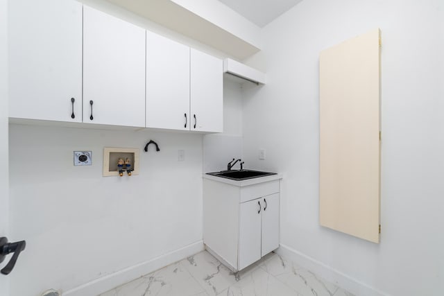 laundry room featuring hookup for a washing machine, hookup for an electric dryer, cabinets, and sink