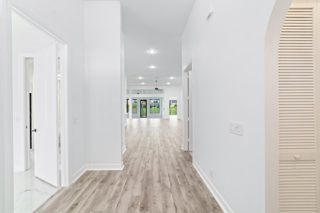 corridor featuring light wood-type flooring