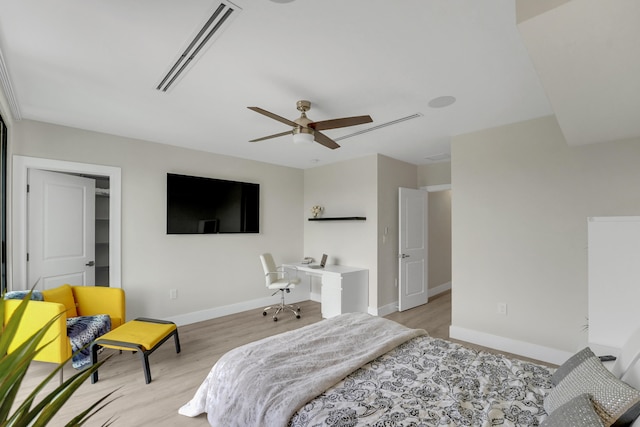 bedroom with light wood-type flooring and ceiling fan