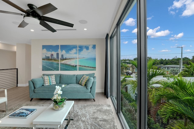 interior space featuring ceiling fan and light hardwood / wood-style floors