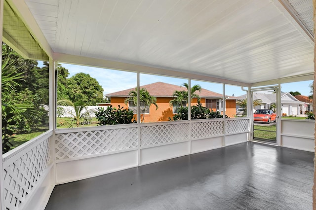 unfurnished sunroom with a healthy amount of sunlight