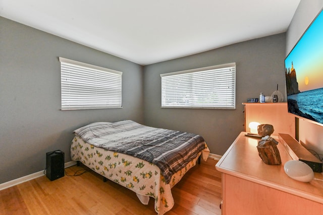 bedroom featuring light wood-type flooring