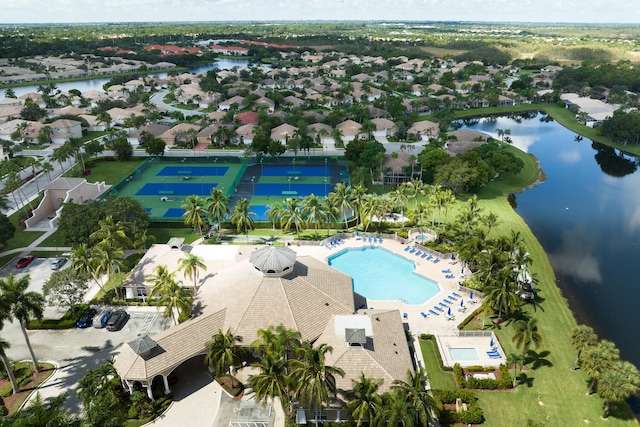 bird's eye view featuring a residential view and a water view