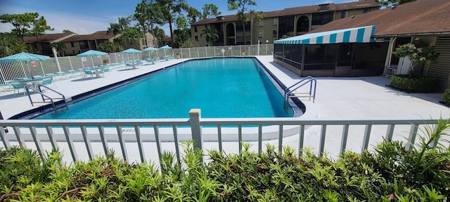 view of pool featuring a patio area