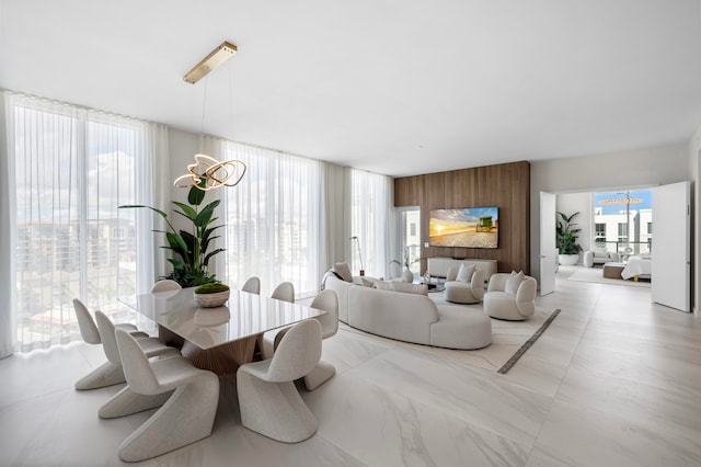 dining area featuring an inviting chandelier