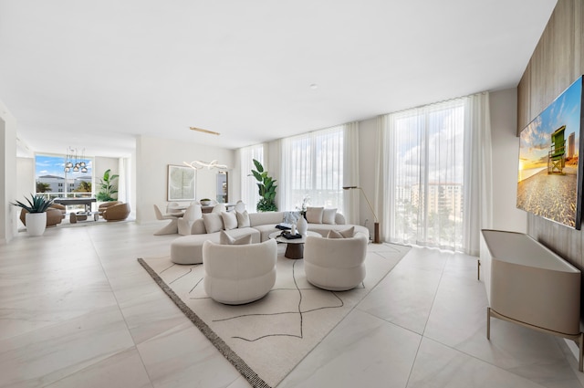 tiled living room with a chandelier