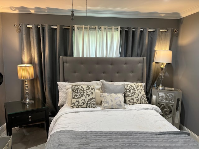 bedroom featuring ornamental molding