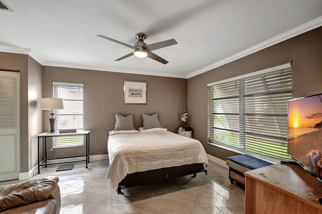 bedroom with ceiling fan, light tile patterned floors, and crown molding