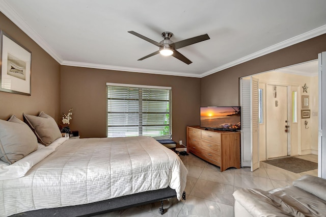 bedroom with ornamental molding and ceiling fan