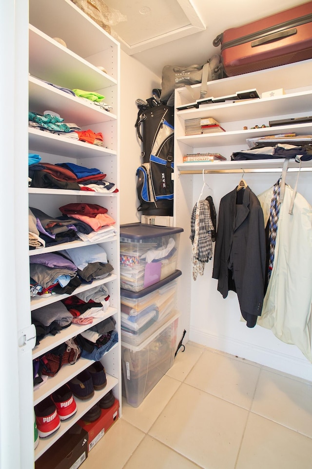 spacious closet with tile patterned flooring