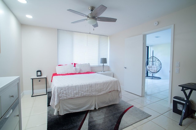 tiled bedroom with ceiling fan