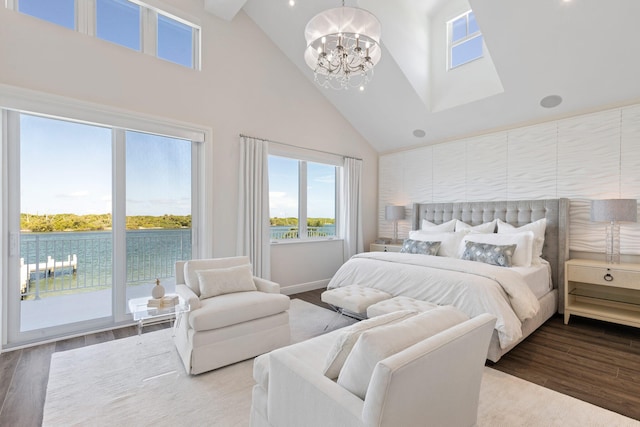 bedroom featuring a chandelier, high vaulted ceiling, access to exterior, and wood-type flooring