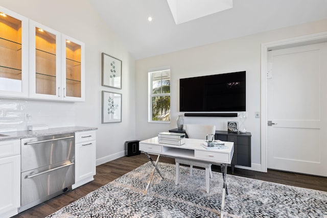 office area featuring lofted ceiling and dark hardwood / wood-style floors