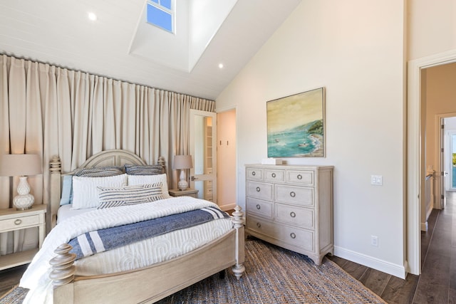 bedroom with dark hardwood / wood-style floors and high vaulted ceiling