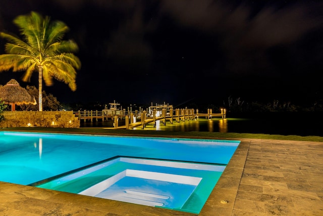 pool at twilight with a water view