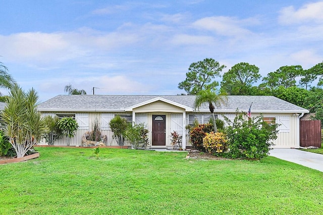 ranch-style house with a front yard