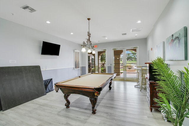 game room with light hardwood / wood-style flooring, pool table, and french doors