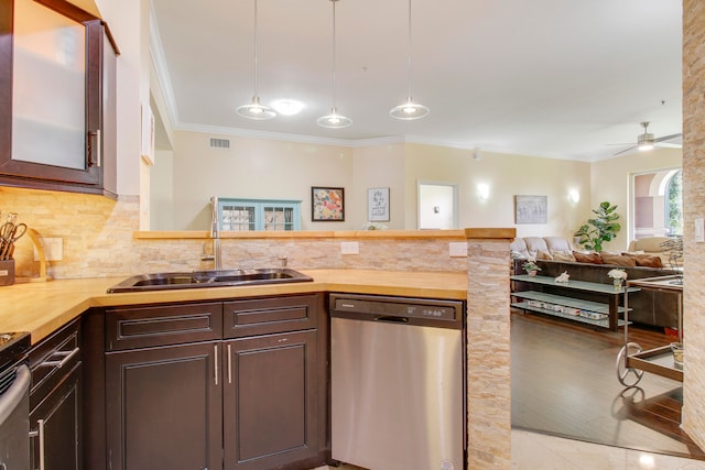 kitchen with hanging light fixtures, sink, ceiling fan, tasteful backsplash, and stainless steel dishwasher