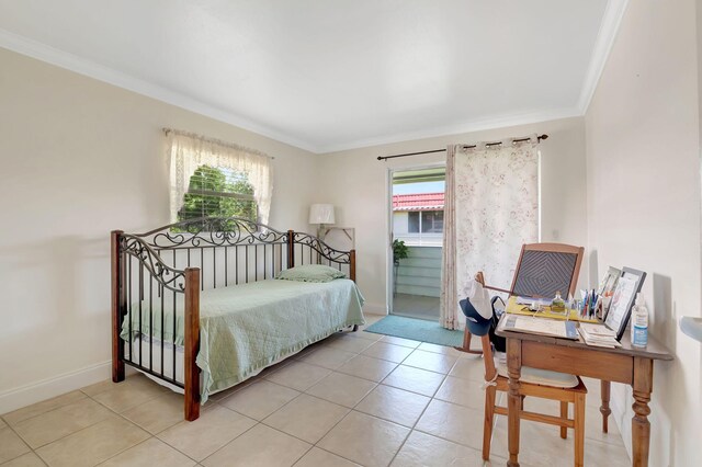 bedroom with ornamental molding, multiple windows, baseboards, and light tile patterned floors