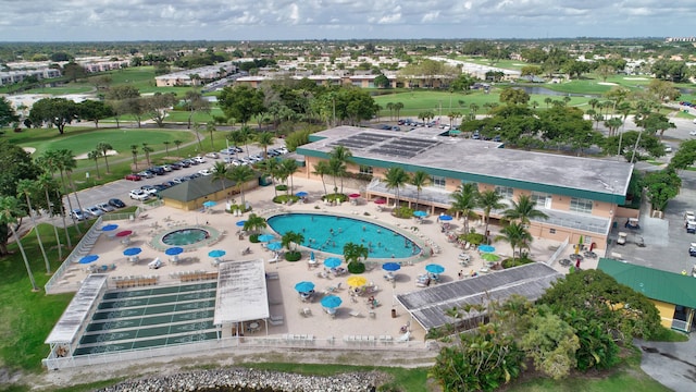 drone / aerial view featuring view of golf course