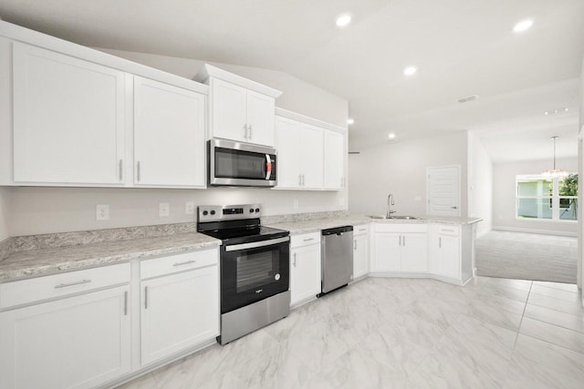 kitchen featuring kitchen peninsula, sink, white cabinets, and stainless steel appliances