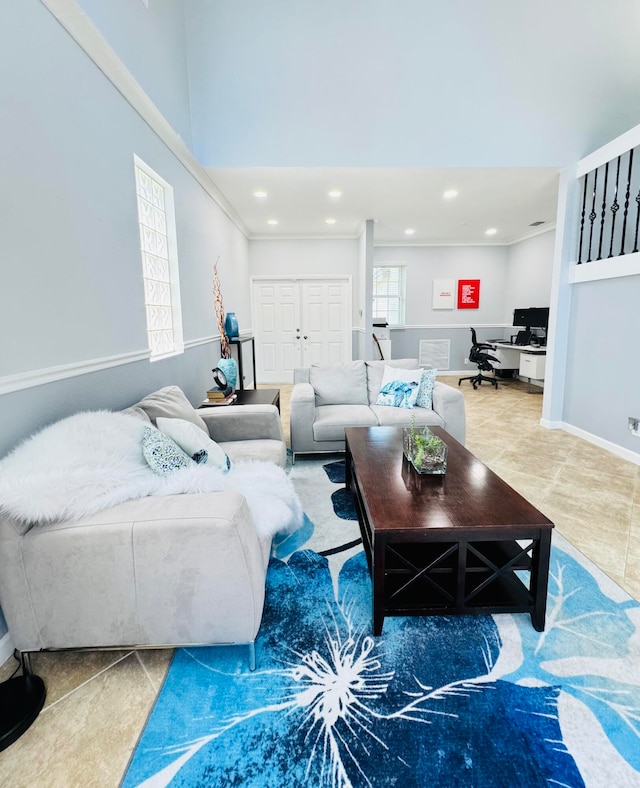 tiled living room featuring ornamental molding