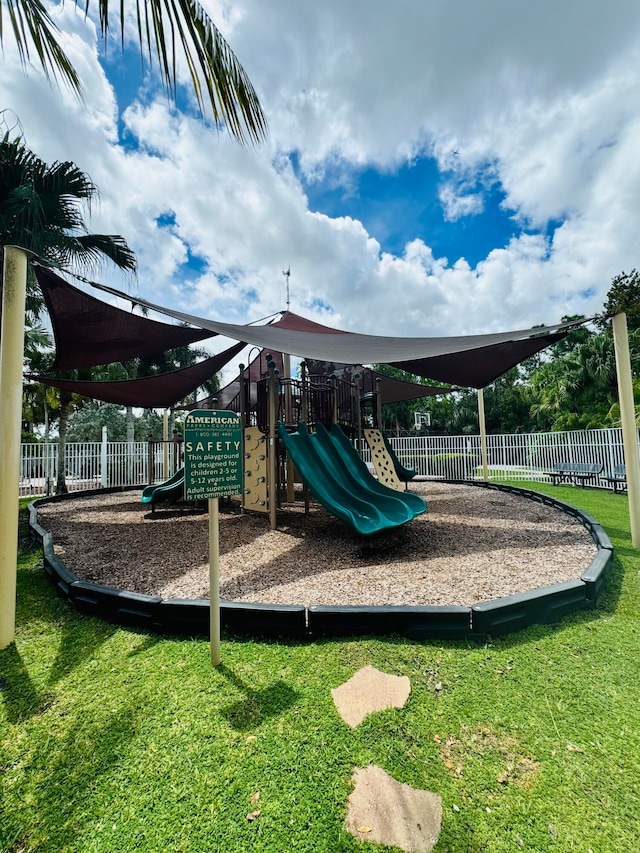 view of play area with a yard