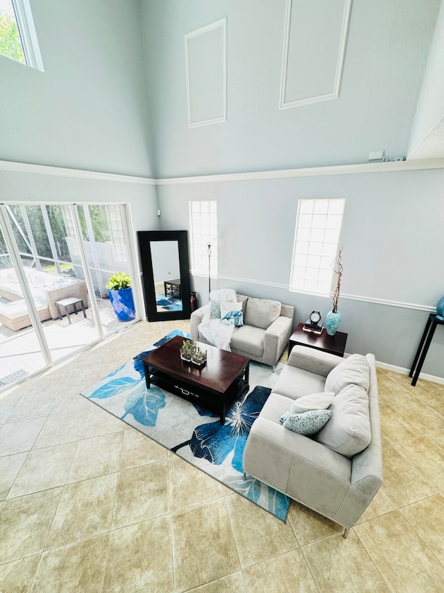 tiled living room with a high ceiling