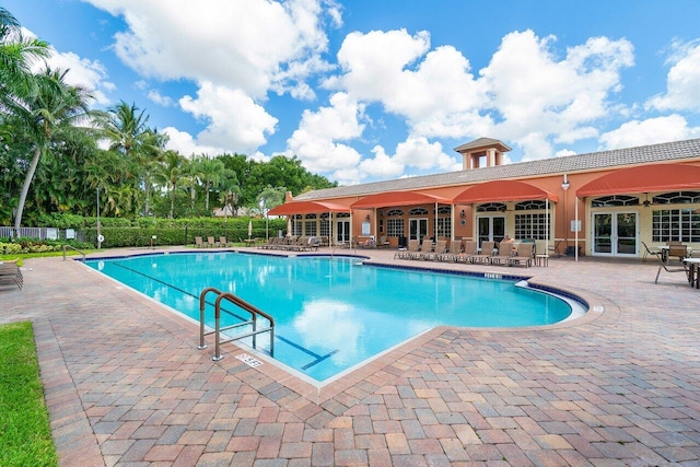 view of swimming pool with a patio area